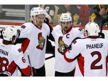 Ottawa Senators captain Erik Karlsson celebrates his goal with teammates during the first period.