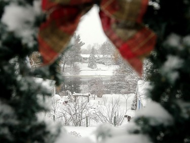 Fifteen centimetres of snow clogged the city Monday morning, but the view over the Rideau River in Manotick was like a picture postcard.