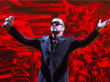 British singer George Michael performs on stage during a charity gala for the benefit of Sidaction, at the Opera Garnier in Paris, on September 9, 2012.