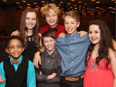 From left, A Christmas Carol child cast members Sébastien Cimpaye (Tiny Tim), Chloe O'Malley (Belinda), Max Dillabough (Tiny Tim), Louis Brault (Peter), Ry Prior (Peter) and Clara Silcoff (Belinda) on Friday, December 16, 2016, at the opening night of the holiday classic at the National Arts Centre.