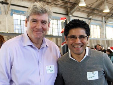 From left, Liberal Ottawa South MPP John Fraser and his colleague, Liberal Ottawa Centre MPP Yasir Naqvi, were among the community leaders to volunteer at the Hamper Packing Day, held at the Horticulture Building on Wednesday, December 21, 2016, in order to fill 500 food hampers for individuals and families in need this Christmas.