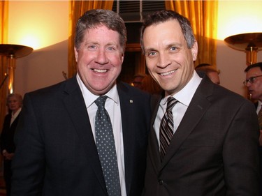 From left, St. Francis Xavier University president Kent MacDonald (also former president of Algonquin College), with Algonquin College board member Mark Sutcliffe at the Embassy of France on Tuesday, Demcember 6, 2016, for former prime minister Brian Mulroney's induction into the French Legion of Honour.