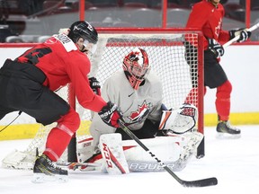 Goalie Connor Ingram of Team Canada makes the save on Mathew Barzal during practice at Canadian Tire Centre in Ottawa, December 20, 2016.