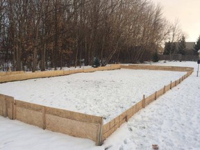 Rob and Nicole Meekin have been told to take the boards down on the rink they build each winter behind their house in Riverside South. The rink is on city land.