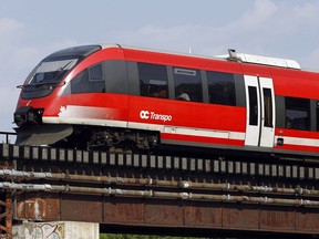 A Trillium Line train crosses a bridge near Carleton University in this file picture.