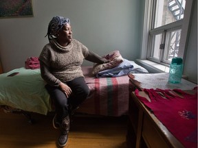 Justine, a refugee recently arrived in Canada from Burundi via Rwanda, sits in her new room at Carty House. This is for a story on Carty House, a transitional home for refugee women that aids them in pursuing educational and vocational channels necessary towards integrating into Canadian society and leading an independent life.