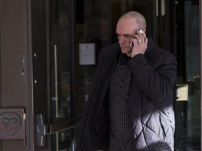 Kevin Bishop leaves the Ottawa Courthouse on Friday December 9, 2016. Errol McGihon/Postmedia
