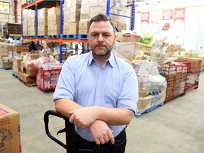 Michael Maidment, Executive Director of the Ottawa Food Bank is photographed in the warehouse, January 13, 2016.
