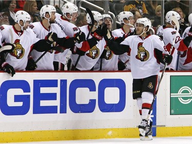 Ottawa Senators' Mike Hoffman (68) celebrates his goal as he returns to the bench in the second period of an NHL hockey game against the Pittsburgh Penguins in Pittsburgh, Monday, Dec. 5, 2016.