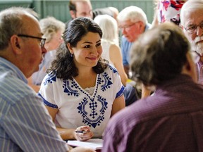 Minister of Democratic Institutions and Peterborough-Kawartha MP Maryam Monsef takes part in a group conversation at a town hall meeting on electoral reform at the Mount Community Centre on Sept. 6, 2016.