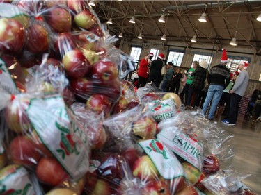 More than 200 volunteers, many from corporate sponsors, came out to help with the Hamper Packing Day held at the Horticulture Building at Lansdowne on Wednesday, December 21, 2016, in support of the Christmas Exchange Program.