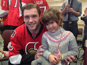Nabila Lemke poses with Sens star Bobby Ryan at their second meeting at CHEO earlier this month.