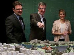 The Honourable Melanie Joly, Minister of Canadian Heritage, announced the signing of a statement that formalizes representation of the two mayor municipalities in Canada's Capital Region on the Board of Directors of the National Capital Commission in Ottawa Monday April 11, 2016. Melanie Joly along with Gatineau Mayor Maxime Pednaud-Jobin and Ottawa Mayor Jim Watson after the press conference Monday.