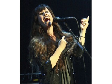 Alanis Morissette  and her band in concert in Southam Hall at the NAC