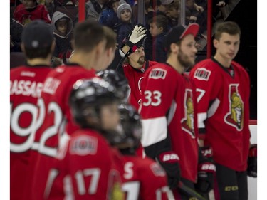 Erik Karlsson acknowledges the crowd as he joins his team for the skills competition.