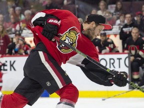 Ottawa Senators defenceman Freddy Claesson leans into one on his way to winning the hardest shot event at the Sens Skills Competition at the Canadian Tire Centre on Friday Dec. 30, 2016.