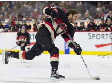 Mike Hoffman competes in the hardest shot event.