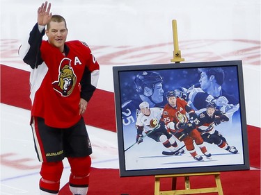 Ottawa Senators right wing Chris Neil (25) acknowledges the crowd during a ceremony to celebrate his 1000th NHL game prior to the game against the San Jose Sharks at the Canadian Tire Centre on Wednesday December 14, 2016. Errol McGihon/Postmedia