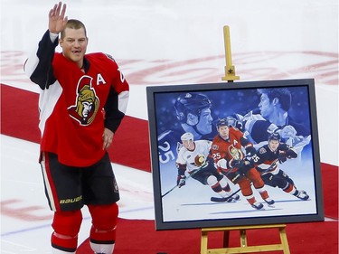 Ottawa Senators right wing Chris Neil (25) acknowledges the crowd during a ceremony to celebrate his 1000th NHL game prior to the game against the San Jose Sharks at the Canadian Tire Centre on Wednesday December 14, 2016.