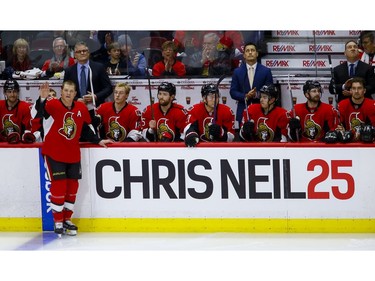 Ottawa Senators right wing Chris Neil (25) acknowledges the crowd during a ceremony to celebrate his 1000th NHL game prior to the game against the San Jose Sharks at the Canadian Tire Centre on Wednesday December 14, 2016. Errol McGihon/Postmedia
