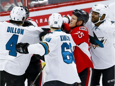 Ottawa Senators right wing Chris Neil (25) in the thick of it as usual against the San Jose Sharks during NHL action at the Canadian Tire Centre on Wednesday December 14, 2016. Errol McGihon/Postmedia
