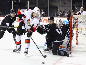 Calvin de Haan #44 of the New York Islanders defends against Derick Brassard #19 of the Ottawa Senators.
