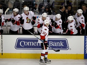 Chris Kelly #22 of the Ottawa Senators is congratulated by teammates after he scored a goal on the San Jose Sharks in the third period SAP Center on December 7, 2016 in San Jose, California.
