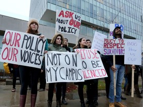 Protesters await members of Carleton's board of governors.