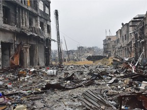 A general view shows destruction in Aleppo's old city on December 13, 2016. After weeks of heavy fighting, regime forces were poised to take full control of Aleppo, dealing the biggest blow to Syria's rebellion in more than five years of civil war.   /