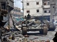 Syrian pro-government forces advance in the northern embattled city of Aleppo on December 14, 2016.