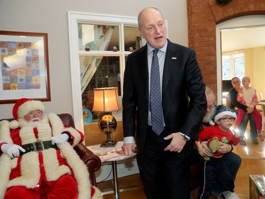 The big jolly fella arrived at Ronald McDonald House Thursday (Dec. 15/2016) as the United States Marine Corp. and US. Navy brought hundreds of toys for sick kids along with American ambassador, Bruce Heyman (centre). Here, Santa gets a big hug and a nuzzle from Charlotte Henderson, 3, who was a guest at the house where her grandma volunteers.