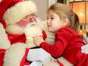 The big jolly fella arrived at Ronald McDonald House Thursday (Dec. 15/2016) as the United States Marine Corp. and US. Navy brought hundreds of toys for sick kids along with American ambassador, Bruce Heyman. Here, Santa gets a big hug and a long list from Charlotte Henderson, 3, who was a guest at the house where her grandma volunteers.
