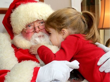 The big jolly fella arrived at Ronald McDonald House Thursday (Dec. 15/2016) as the United States Marine Corp. and US. Navy brought hundreds of toys for sick kids along with American ambassador, Bruce Heyman. Here, Santa gets a big hug and a nuzzle from Charlotte Henderson, 3, who was a guest at the house where her grandma volunteers.