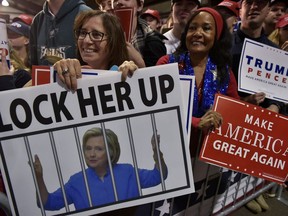 During the U.S. presidential election campaign, Donald Trump supporters often chanted 'Lock Her Up" about Hillary Clinton. This past weekend, crowds at a rally in Edmonton used the same chant in reference to Premier Rachel Notley./ AFP PHOTO / MANDEL NGANMANDEL NGAN/AFP/Getty Images
