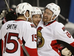 There have been a number of Ottawa Senators heating up offensively lately, including, from left, Zack Smith, Derick Brassard and Mark Stone, who are seen celebrating a Brassard goal against the Islanders on Sunday, Dec. 18, 2016.