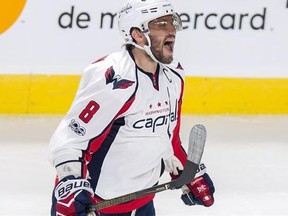 Washington Capitals left wing Alex Ovechkin (8) celebrates his power play goal against the Montreal Canadiens during third period NHL hockey action Monday, January 9, 2017 in Montreal. THE CANADIAN PRESS/Paul Chiasson