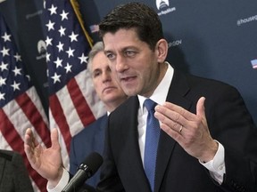 In this Jan. 10, 2017, photo, House Speaker Paul Ryan of Wis., accompanied by House Majority Leader Kevin McCarthy of Calif., meets with reporters on Capitol Hill in Washington. For decades, congressional Republicans have pushed to slash the budget and reduce the size of the federal government, especially during the eight years Democratic President Barack Obama was in office. Now that Republican President-elect Donald Trump is poised to take charge, deficits and debt just don‚Äôt seem to matter