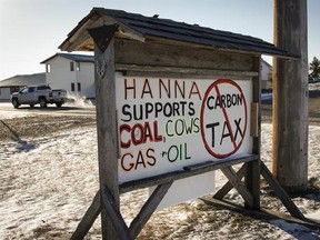 Residents of Hanna, Alta. have erected a sign showing their feelings about government policies as seen on Tuesday, Dec. 13, 2016.THE CANADIAN PRESS/Jeff McIntosh