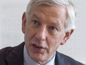 Dominic Barton, chairman of an advisory committee to federal Finance Minister Bill Morneau, responds to a question during an interview with The Canadian Press, in Montreal in a May 19, 2016, file photo.The head of the Trudeau government&#039;s influential council of economic advisers recommends Ottawa stay agile, just in case Donald Trump delivers on vows that could have severe implications for Canada.