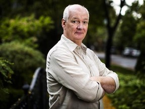 Actor Colin Mochrie poses for a portrait as he promotes his new book &ampquot;Not Quite the Classics&ampquot; in Toronto, Monday October 7, 2013. Mochrie says he welcomes his new role as a champion for transgender rights after speaking out in support of his daughter.THE CANADIAN PRESS/Mark Blinch