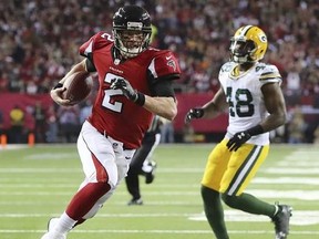 Atlanta Falcons' Matt Ryan runs for a touchdown during the first half of the NFL football NFC championship game against the Green Bay Packers, Sunday, Jan. 22, 2017, in Atlanta.