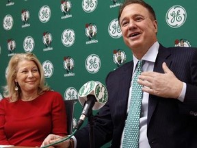 Boston Celtics co-owner Steve Pagliuca, right, speaks alongside General Electric Chief Marketing Officer Linda Boff during a news conference Wednesday, Jan. 25, 2017, at GE&#039;s headquarters in Boston. The Celtics reached an agreement with GE to put the company's logo on the team's uniform beginning next season.