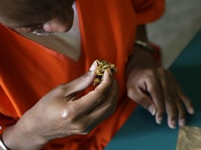 In this Oct. 26, 2016 photo, inmate Kevin Dickens eats a chunk of nutraloaf during an interview with The Associated Press at James T. Vaughn Correctional Center in Smyrna, Del. &ampquot;Basically, it&#039;s baked slop,&ampquot; Dickens explained as he picked at a hunk of nutraloaf during a prison interview. He&#039;s is no stranger to the quasi-palatable concoction also known as an &ampquot;alternative meal plan&ampquot; or &ampquot;behavior modified meal.&ampquot; He holds the dubious distinction of being on a loaf diet for longer than any other Delaw