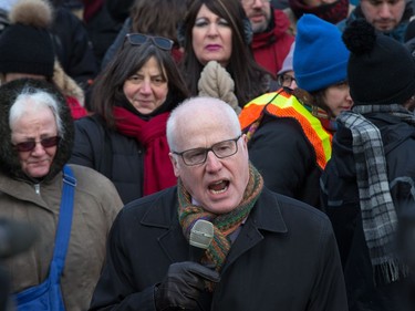 Alex Neve of Amnesty International addresses the crowd during an anti President Trump protest takes place at the Embassy of the United States in Ottawa.