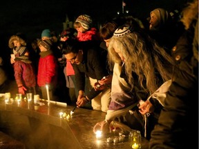 About 1,500 people came out to a Monday night Parliament Hill candlelight vigil for the victims of the Quebec mosque attack.