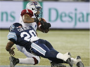 Arland Bruce gets tackled by Major Culbert in 2013.