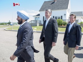 Navdeep Singh Bains, Minister of Innovation, Science and Economic Development, Nova Scotia Premier Stephen McNeil and Scott Brison, President of the Treasury Board, left to right, seen here in a file photo from July, will be among those attending the Atlantic Growth Strategy meeting in Wolfville today. THE CANADIAN PRESS/Andrew Vaughan