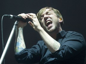Billy Talent frontman Benjamin Kowalewicz performs at Budweiser Gardens in London on Wednesday April 3, 2013.