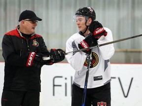 Curtis Lazar of the Ottawa Senators listens to Marc Crawford during morning practice at the Bell Sensplex in Ottawa, January 10, 2017.