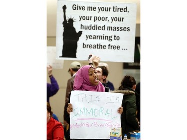 Nicole, who didn't want to give her last name, protests at DFW airport.